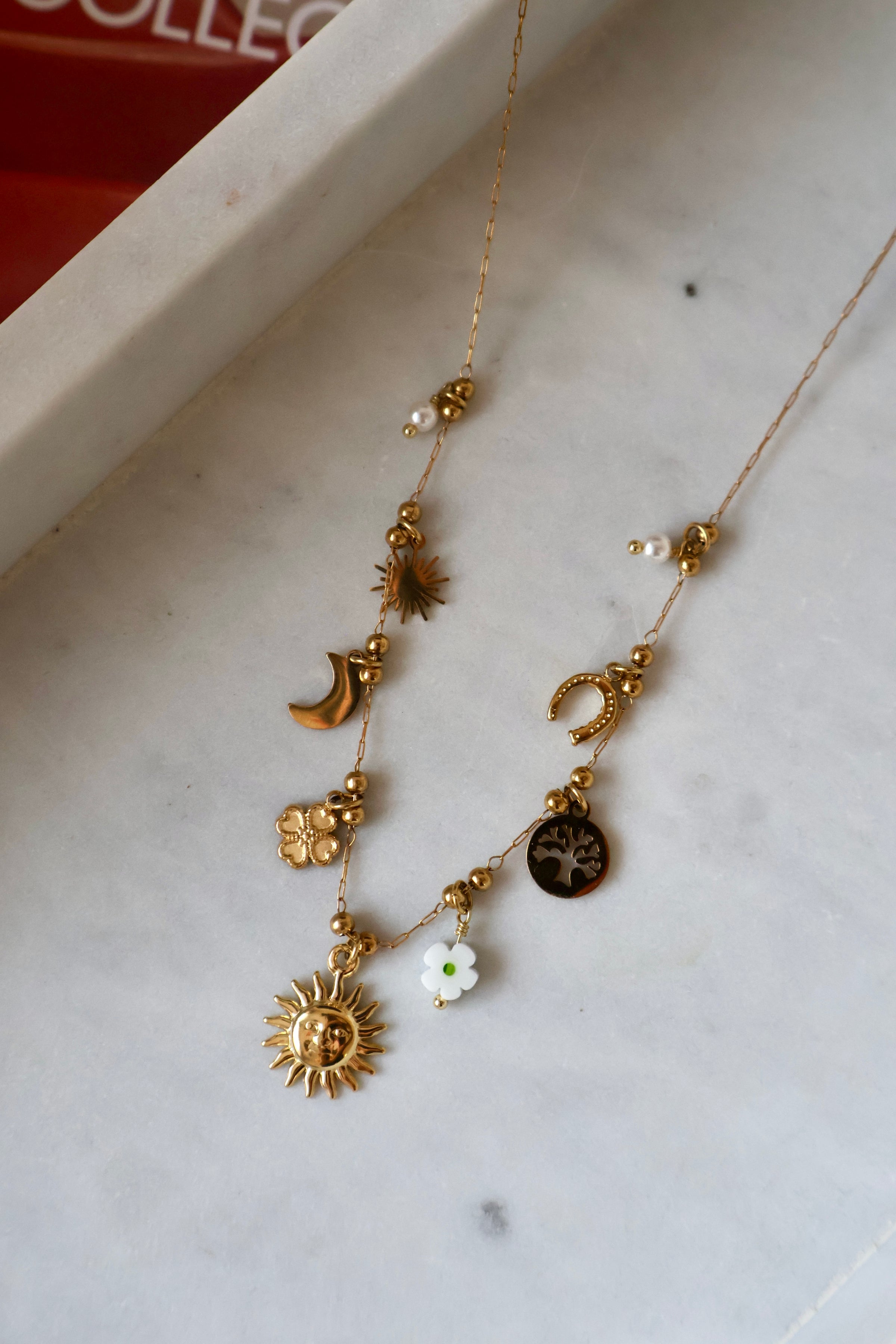 Collier en acier doré avec breloques MÉLIA